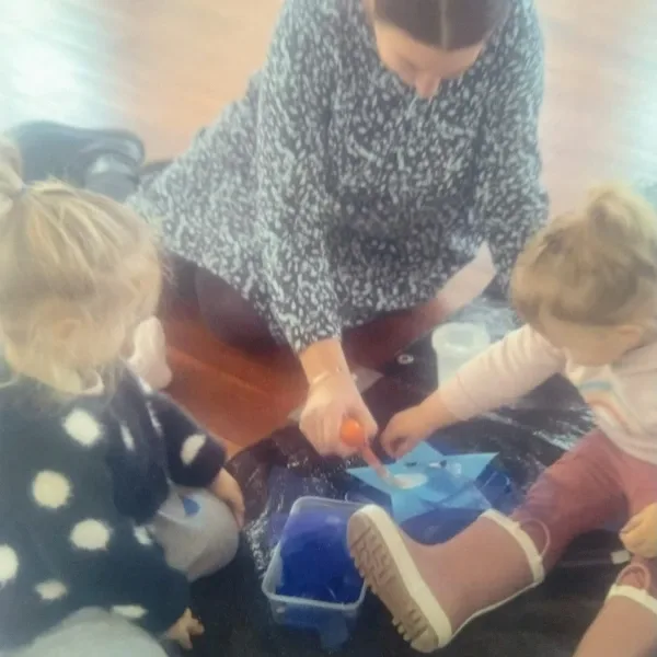 Kerry, home-based educator in Bell Block, with children