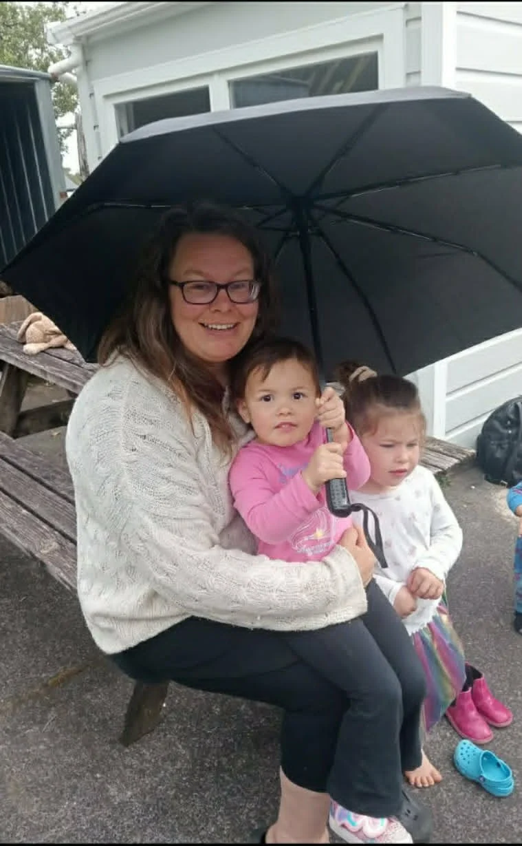 Theresa, home-based educator in Hurdon, with children